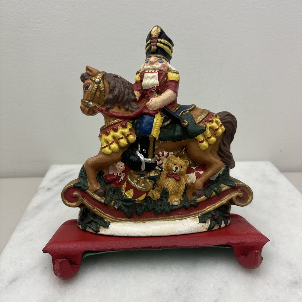Cast Iron Christmas stocking hanger Nutcracker rocking horse double hook Vintage